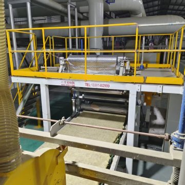 Aluminum foil laminating machine for rock wool slabs and blankets