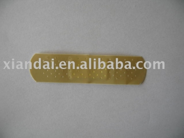Hot melt adhesive bandage