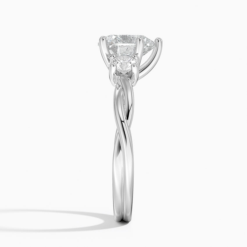 Profile view of the engagement ring highlighting the gallery and bridge