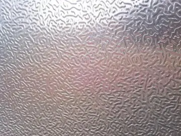 Hammered aluminum sheet for lighting