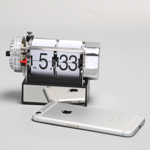 Small Flip Alarm Clock With A Cubic Base