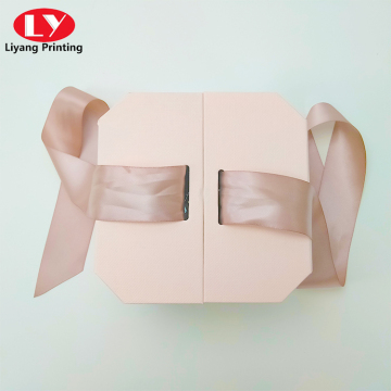 Pink octagonal double open gift box with ribbon
