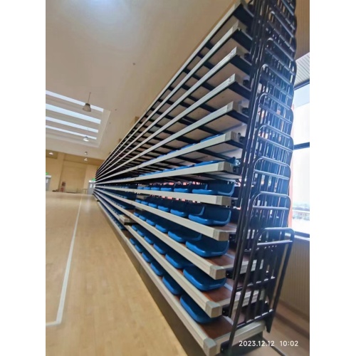Electrical telescopic bleacher seat