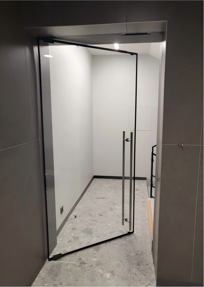 Frameless fire-rated glass
