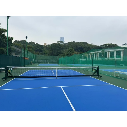 Movable pickle ball post