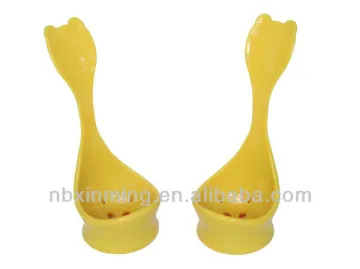 Plastic kitchen spoon with hole