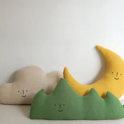 Adorable Moon and Nature-Inspired Baby Nursery Decor: Comfort Cushions, Cloud-Shaped Pillows, and Forest-themed Plushes