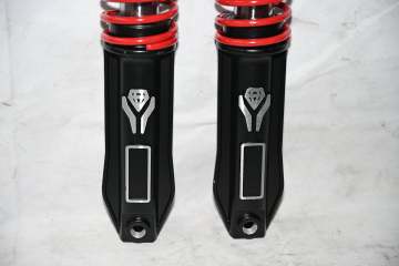 External spring diamond shock absorber