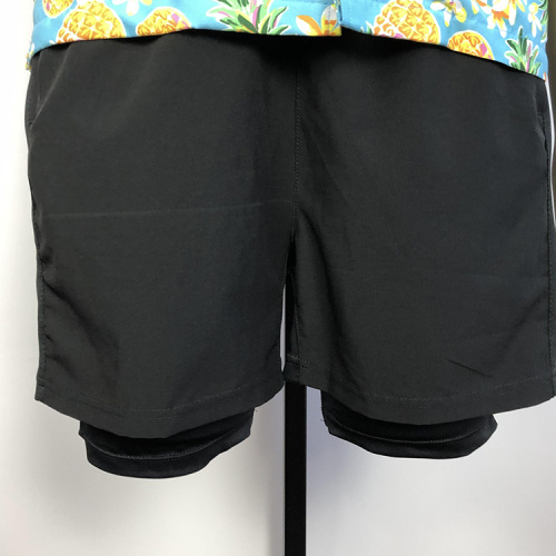 esportes masculinos shorts pretos secos rápidos