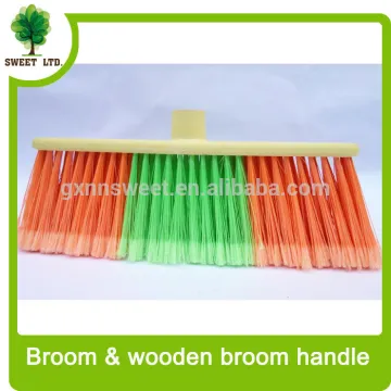 Durable plastic broom with long wood handle