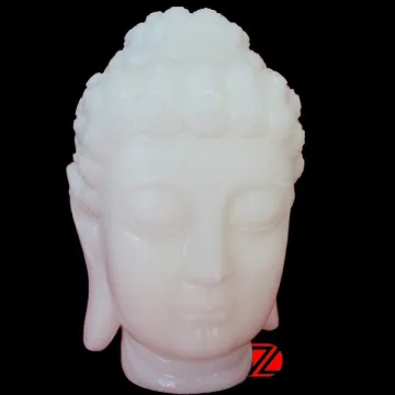 Hand carved stone buddha head