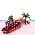 Tarjeta de felicitación emergente 3D con barco de playa tropical