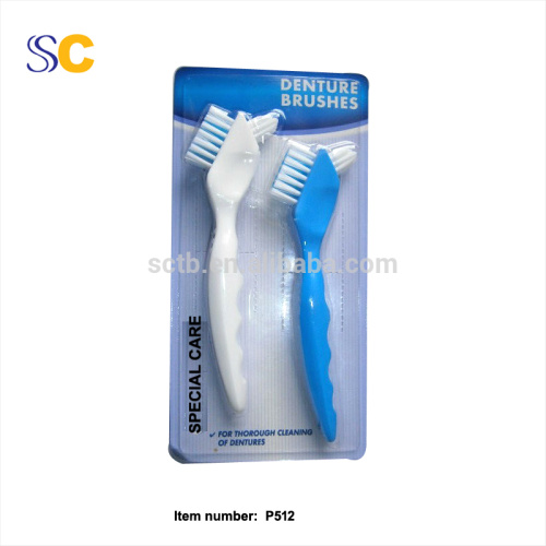 Brosse à dents pour dentier double face