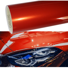 Metallic gloss orange car wrap vinyl.