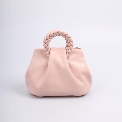 Bolso de mano de bola rosa con asas tejidas