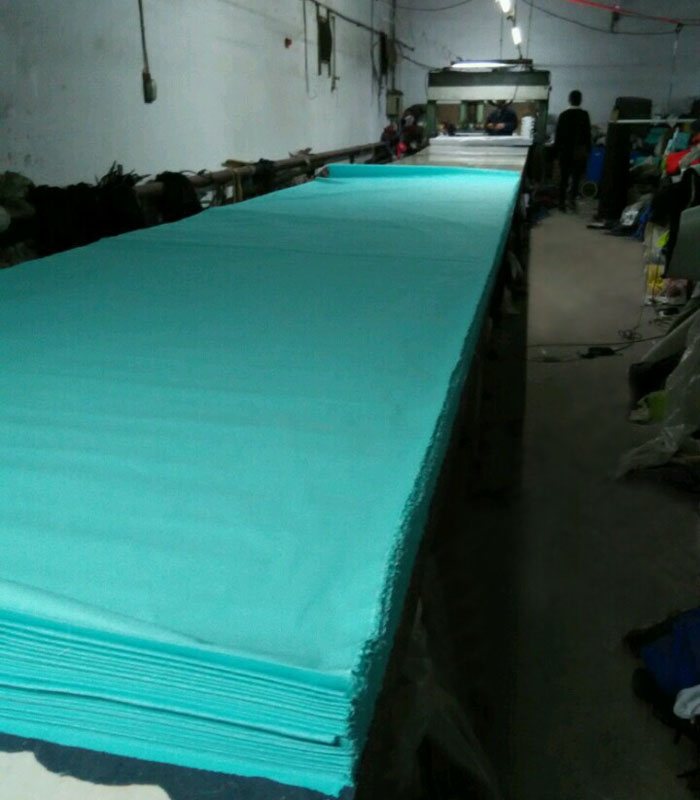 CUTTING cap fabric