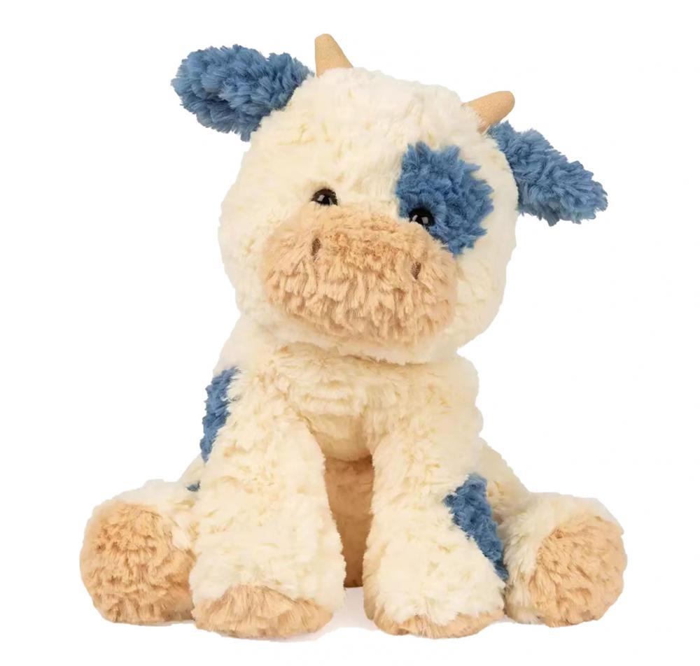 Giocattolo blu, bianco e marrone peluche