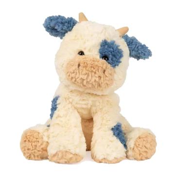 Blue, white and brown cow plush toy