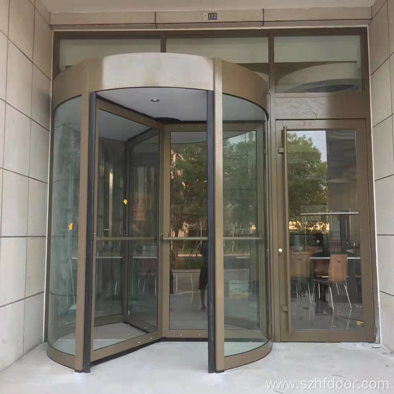 Curved glass revolving door