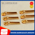 Golden luggage zipper pull