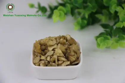 A bite of walnut kernels light pieces