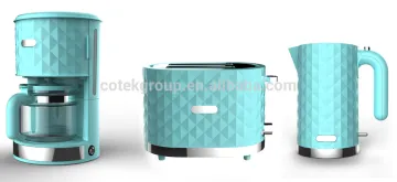 kitchen appliance of breakfast set with coffee maker kettle toaster