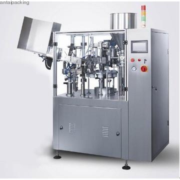 AUTOMATIC TUBE FILLING AND SEALING MACHINE