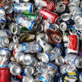 Aluminum Cans Crushed By Compactor Baler