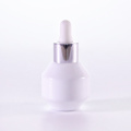 Special shape glass bottle with silver dropper