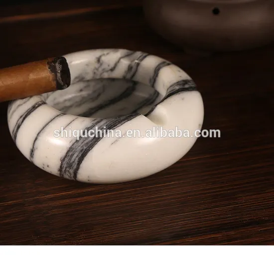 white with black stripes round natural stone ashtray