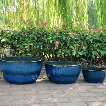 Purple clay glazed garden pots.