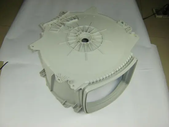 Tumbling box for washing machine mold