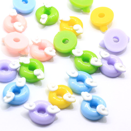Kawaii Mini cuentas de resina en forma de ala de natación con espalda plana 100 unids / bolsa cuentas de decoración artesanal juguete DIY Material espaciador