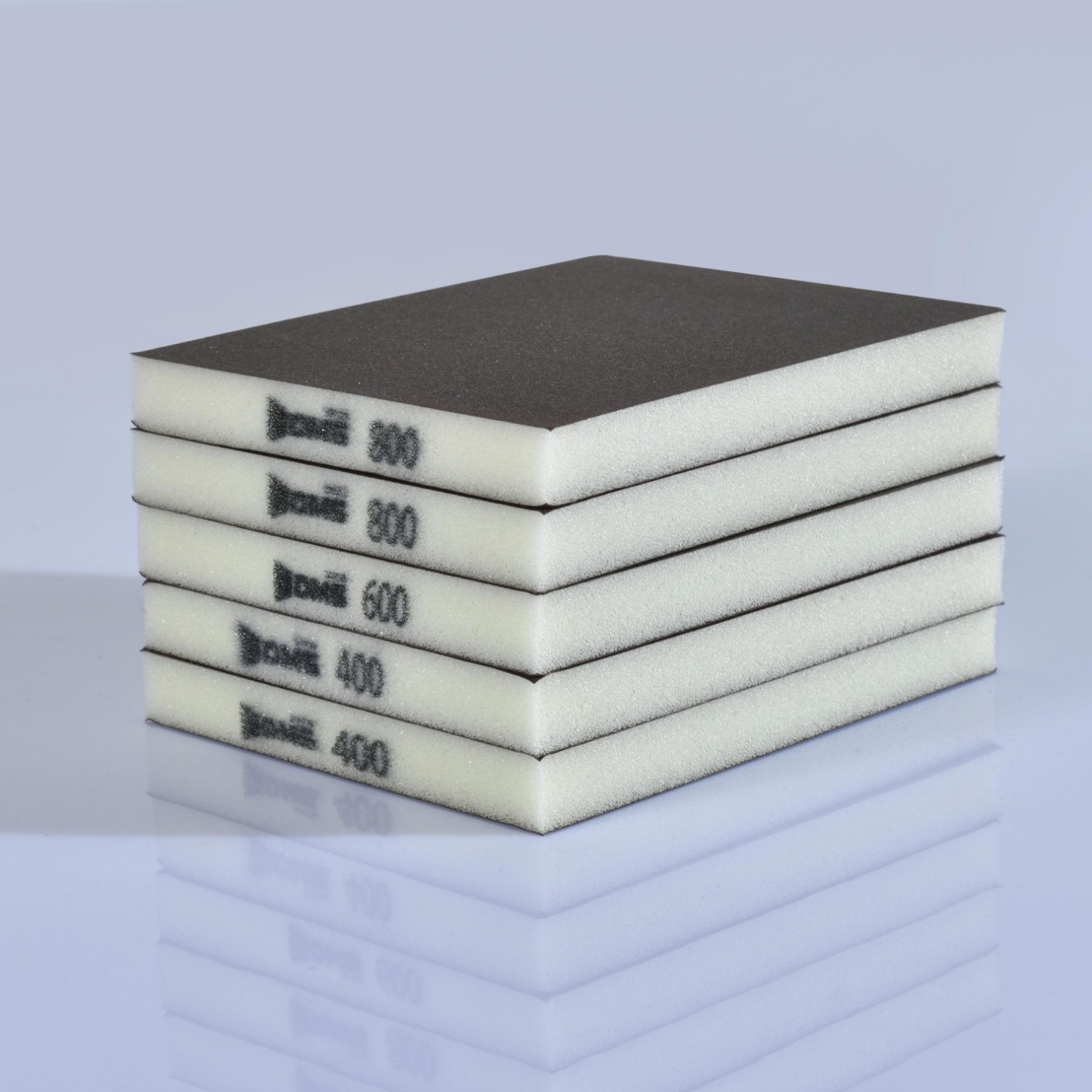 Reusable double-sided sand block