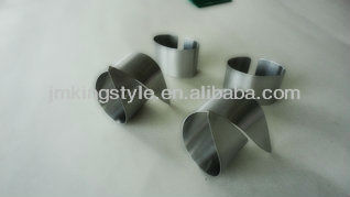 Swirl style napkin holder with salt and pepper shaker