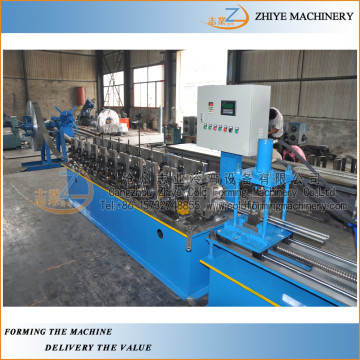 iron door making machine price/iron rolling door slat rolling line/Iron roller shutter door slat forming machine manufacturer