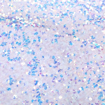 Tessuto per indumenti ricamato con paillettes iridescenti in velluto fantasia