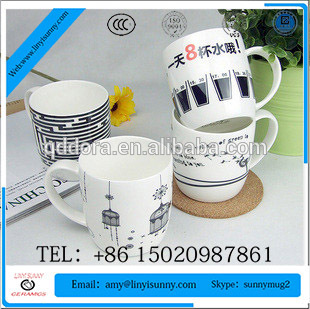 white black ceramic nose mug