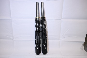 Extended external spring shock absorber