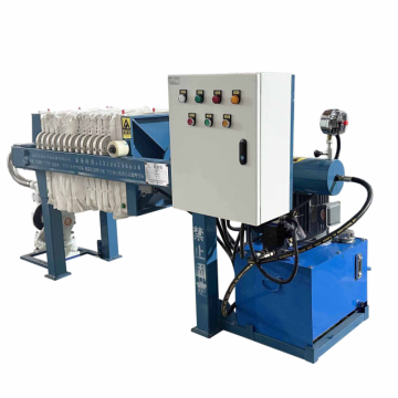 Slurry treatment system sludge filter press