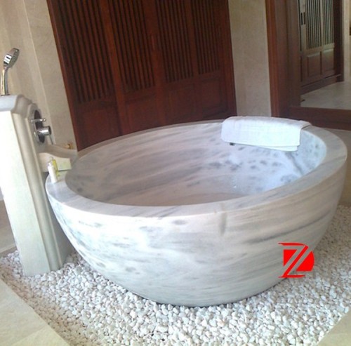 white marble round bathtub