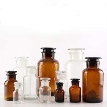 Ambroidery: Amber Wide Mouth Glass Jar with Stopper" 

However, considering the elements you've listed, a more fitting and direct title might be:

"Wide Mouth Amber Glass Jar with Stopper - Bottle, Jar, Bud Vase, Reagent Bottle" 

This title captures the 