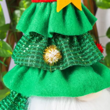 Christmas Skirt Tree: Unique Decorations Featuring a Green Tree, Faceless Old Man, Stars, and a Doll