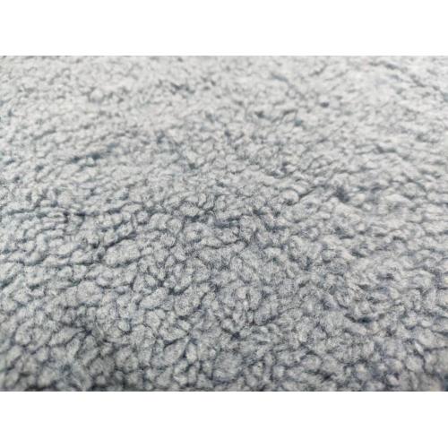 100% polyester Sherpa-liknande fleece varp-stickat tyg