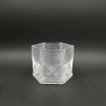 Tarro de cristal de lujo con forma hexagonal en relieve con tapa