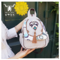 Mochila de lino con borlas Ruyi de estilo bohemio hecha a mano