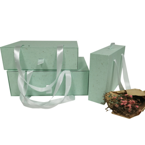 Bio-degradable sliding drawer box with portable handle