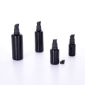 Black round shoulder glass bottle with screw cap