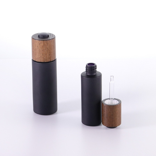 Matte black frost glass bottle with wood dropper