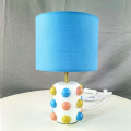 Resin base fabric shade decorative table lamp